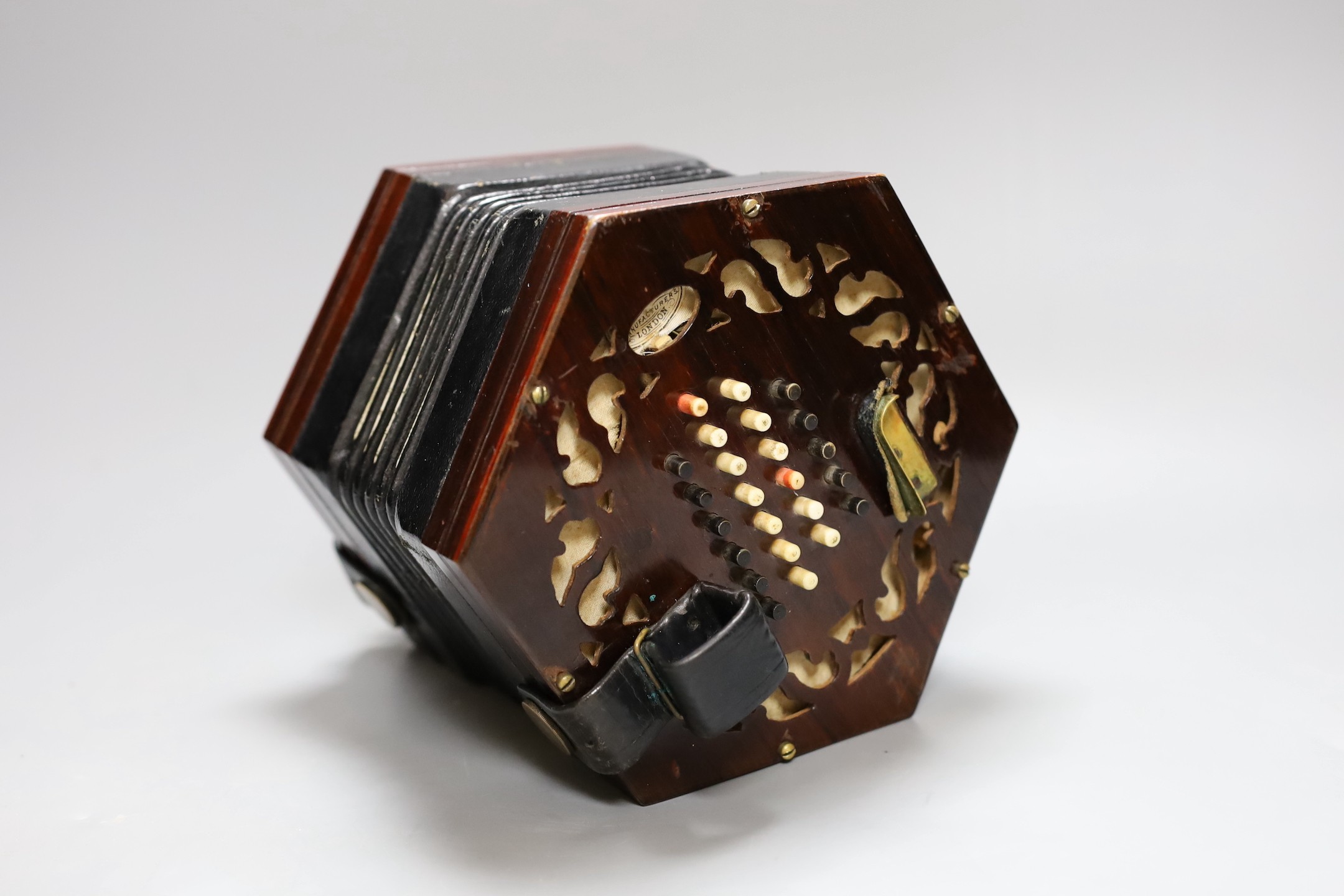 A cased Lachanel & Co rosewood concertina with bone keys, c.1900